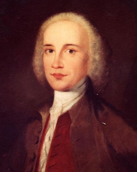 Oil portrait of a young Georgian man in a powdered wig, white stock and lace, with a red waistcoat under a brown coat.