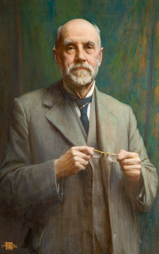 Oil painting of an elderly bald man with a white beard, in a grey suit, holding a pair of spectacles in both hands.