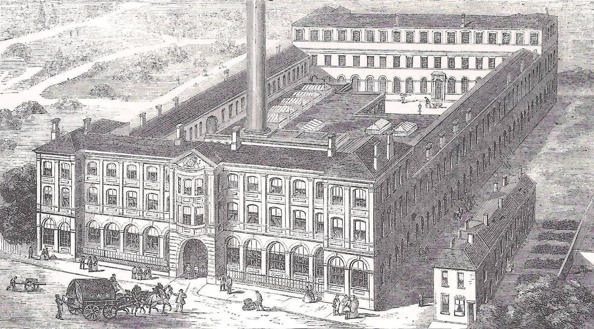 Engraving of a large three-storey factory with a tall chimney, built round a courtyard, with a horse-drawn wagon in the street outside.