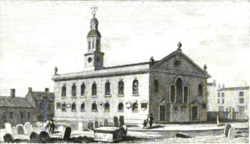 Engraving of a plain brick Georgian church with two rows of arched windows, a pedimented gable with urns and a small domed clock turret, among gravestones.