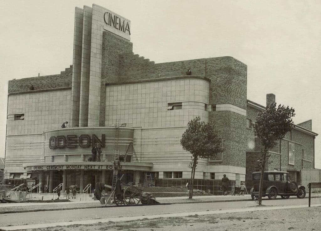 1935: The Odeon Kingstanding in July 1935 with workmen outside and a canopy announcing the grand opening ceremony