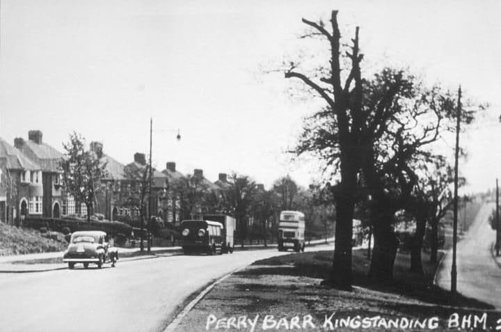 1950: A tree-lined road with semi-detached houses, a car, a lorry and a double-decker bus, captioned Perry Barr Kingstanding.