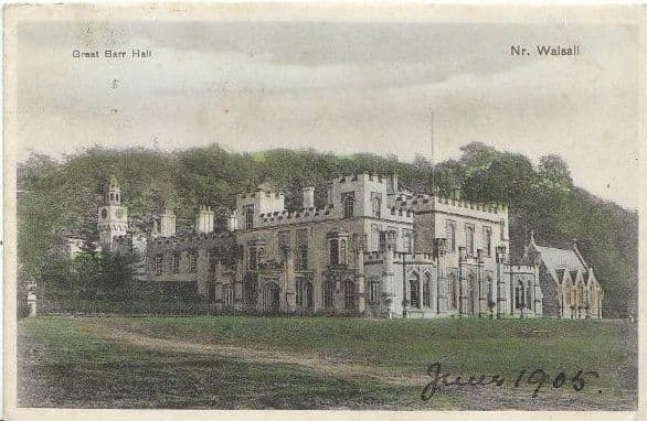 Old postcard view of a large Gothick country house with pointed windows and battlements, beside trees.