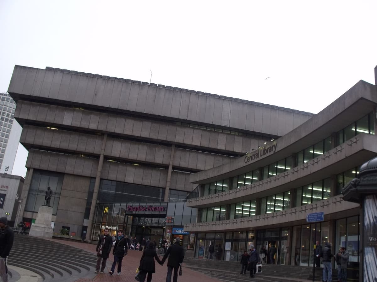 The stepped concrete Central Library seen across Chamberlain Square.