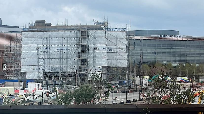 The columned 1838 entrance building of Curzon Street station amid HS2 construction work.