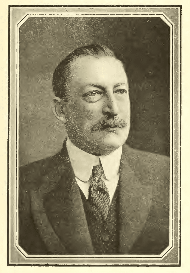 Portrait photograph of a moustached Edwardian man.