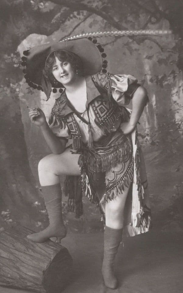 Postcard photograph of an actress in a principal-boy costume as Robin Hood.