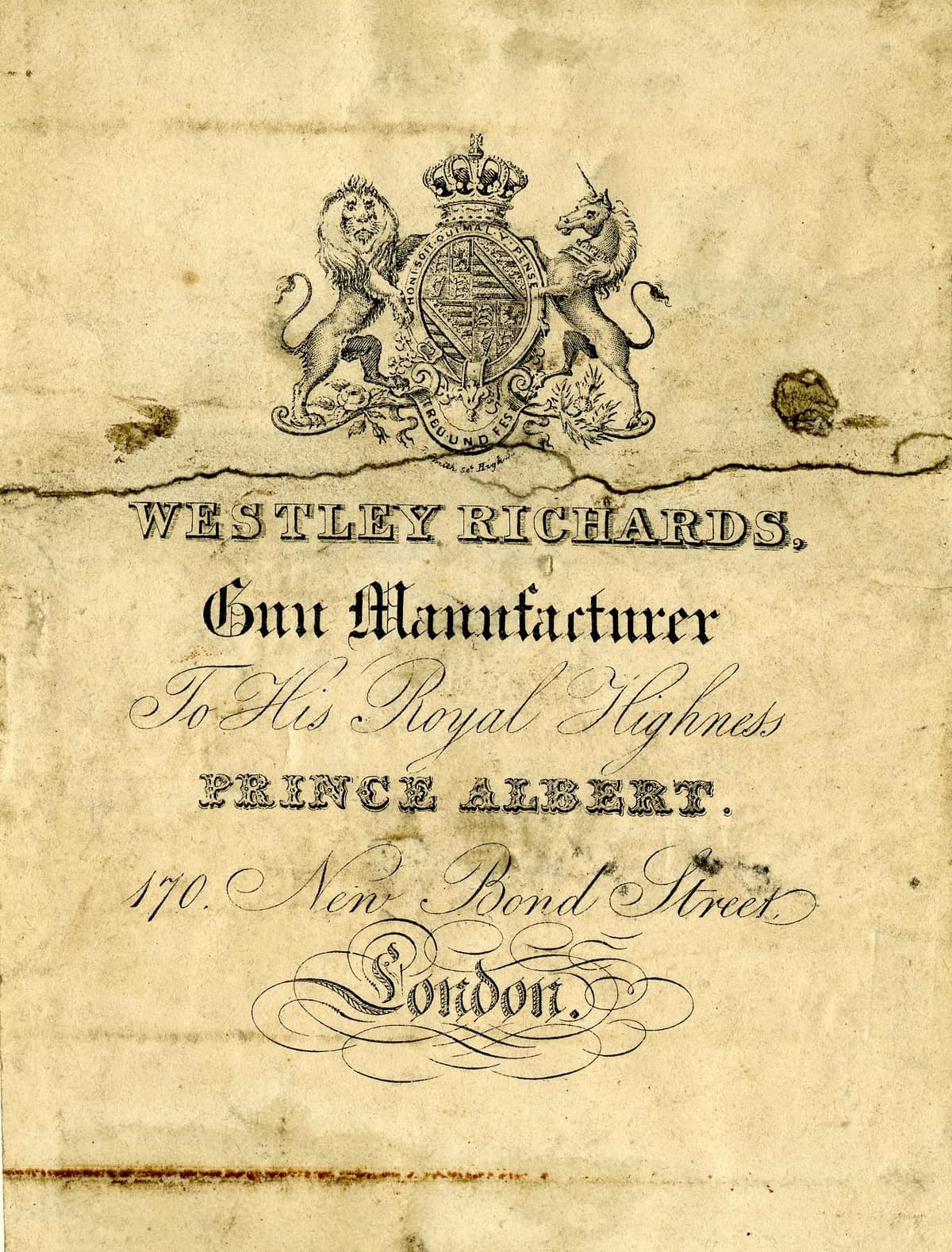 An engraved trade card with the royal arms above the words ‘Westley Richards, Gun Manufacturer to His Royal Highness Prince Albert, 170 New Bond Street, London’.