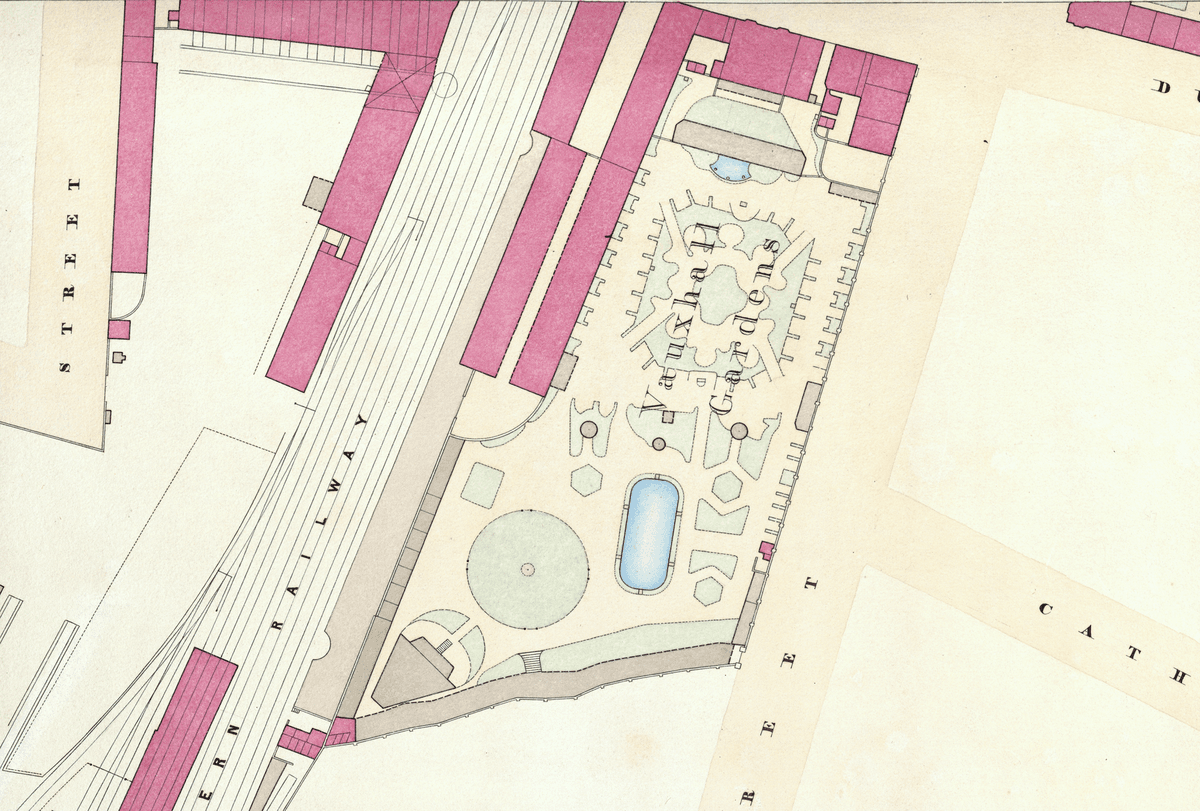 Detail of a coloured town plan showing a small walled garden labelled Vauxhall Gardens beside a railway.