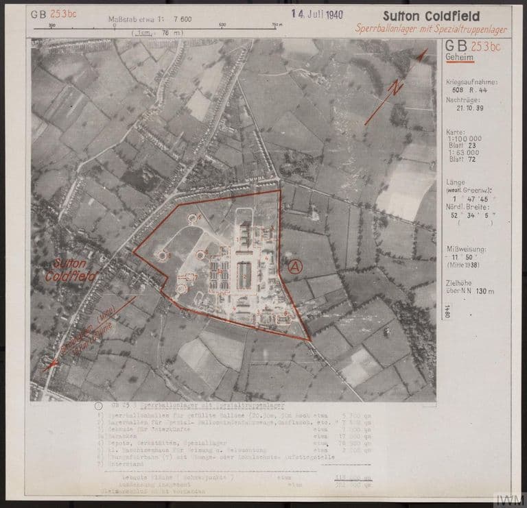 German aerial target photo of fields and houses at Sutton Coldfield with a red outline round a barrage-balloon depot of sheds, hangars and circular mooring beds.