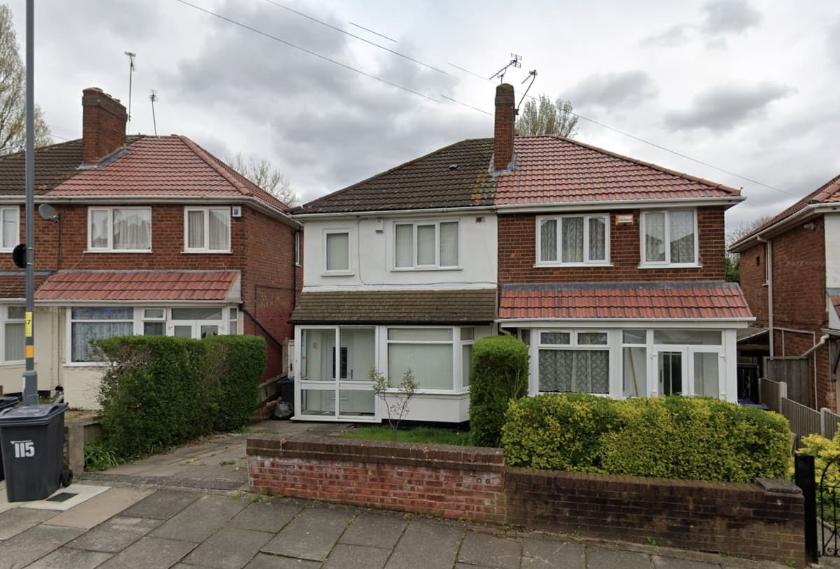 Houses on Oundle Road, Kingstanding, including number 115, as seen on Google Street View in 2022