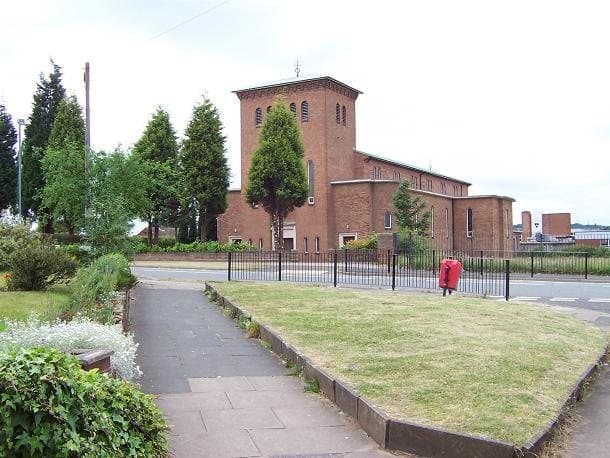 The brick church of Our Lady of the Assumption with its tall square tower, on Old Oscott Hill