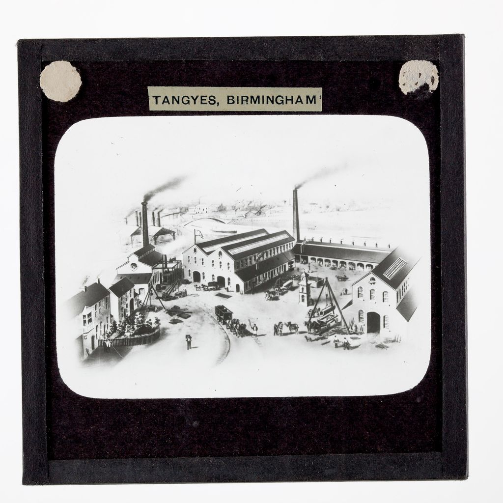 Illustration of the Cornwall Works buildings with chimneys, from a glass lantern slide.
