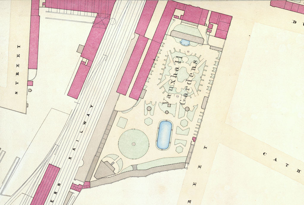 Detail of a coloured town plan showing a small walled garden labelled Vauxhall Gardens beside a railway.