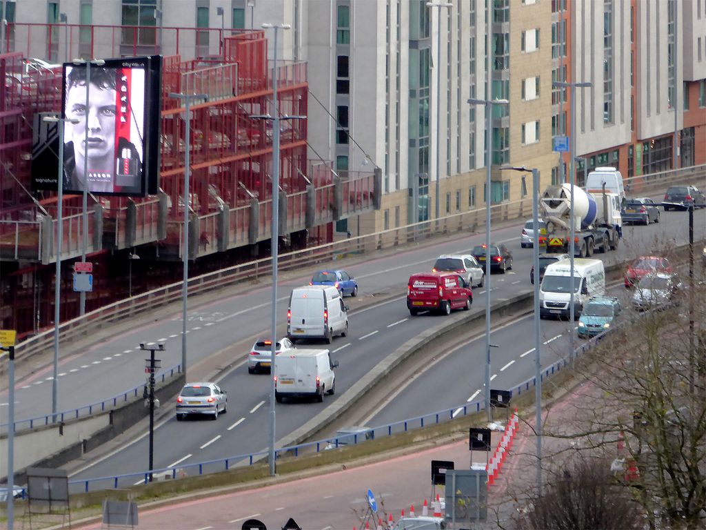 Traffic on a city-centre dual carriageway.